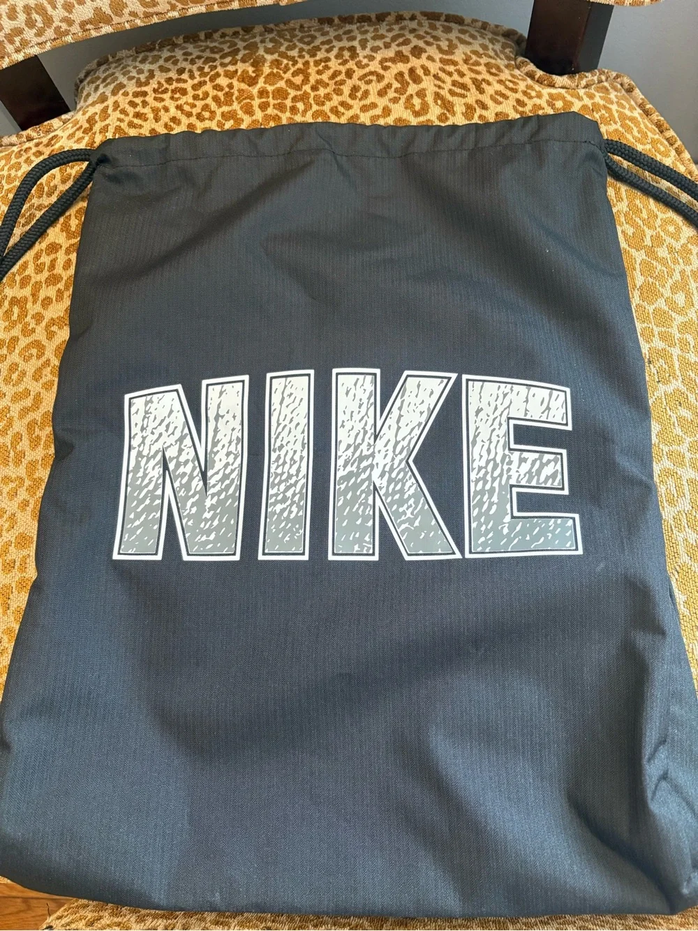 Nike Black Drawstring Backpack with White Logo